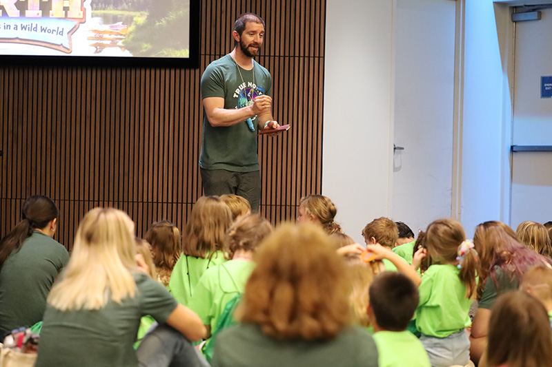 Kids singing during worship at Vacation Bible School