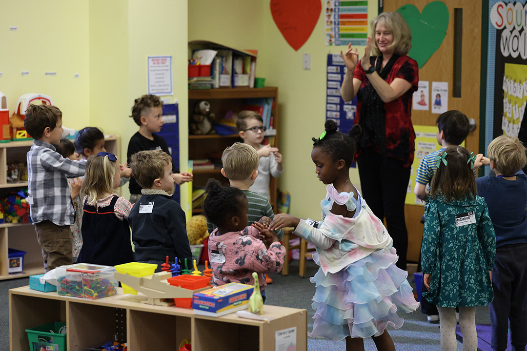 Child enjoying lunch at preschool