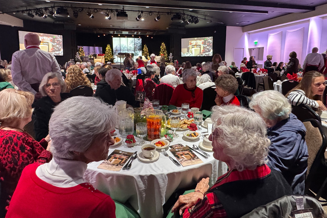 Women celebrating at decorated tables
